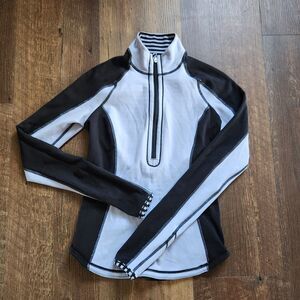 (4) Lululemon reversible half zip jacket